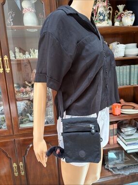 Kipling Black Compact Crossbody Bag with Monkey Charm
